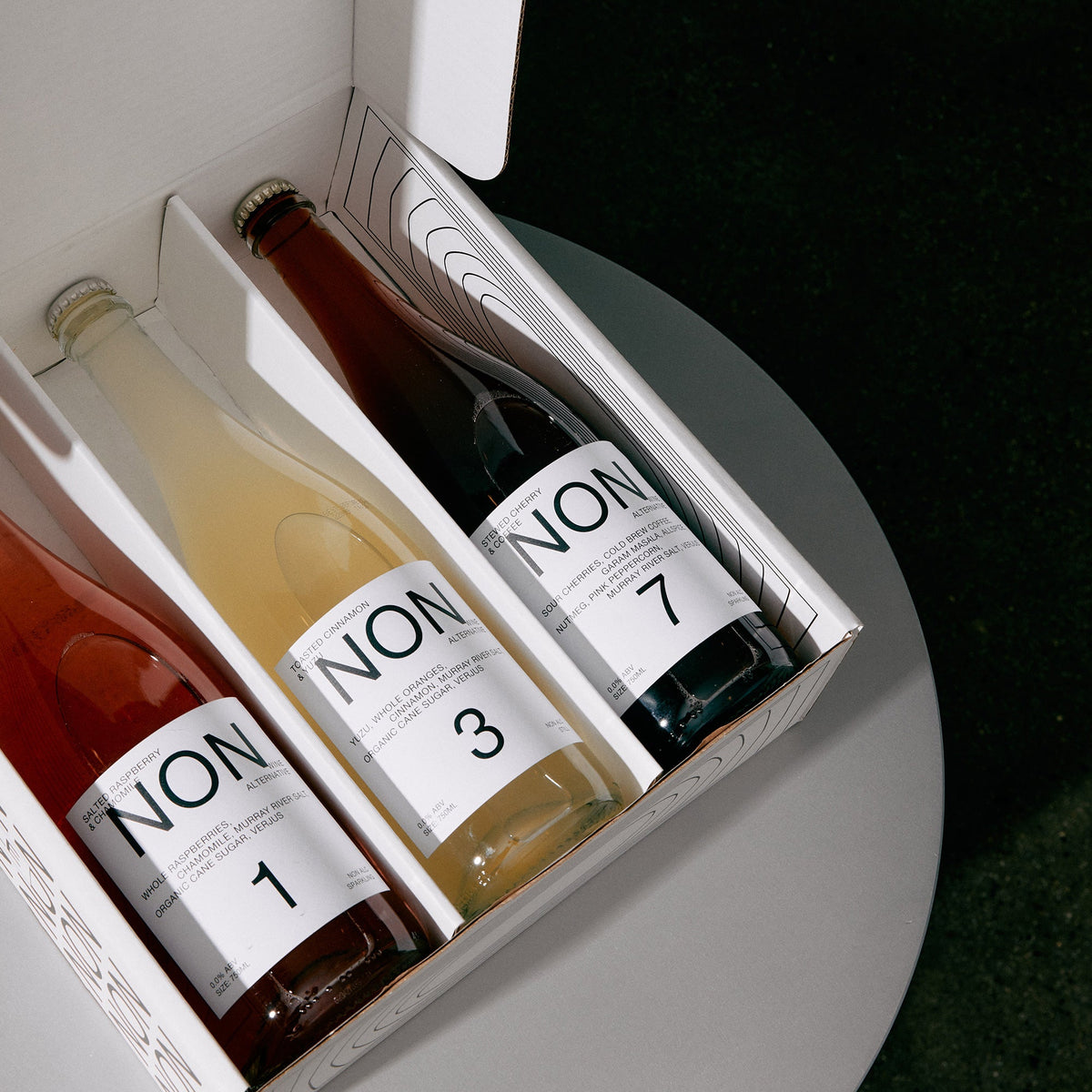 The Stopper Set box opened with bottles inside
